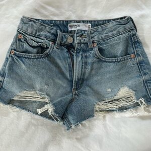Excellent condition size 00/23 “Festival” denim short by Garage
